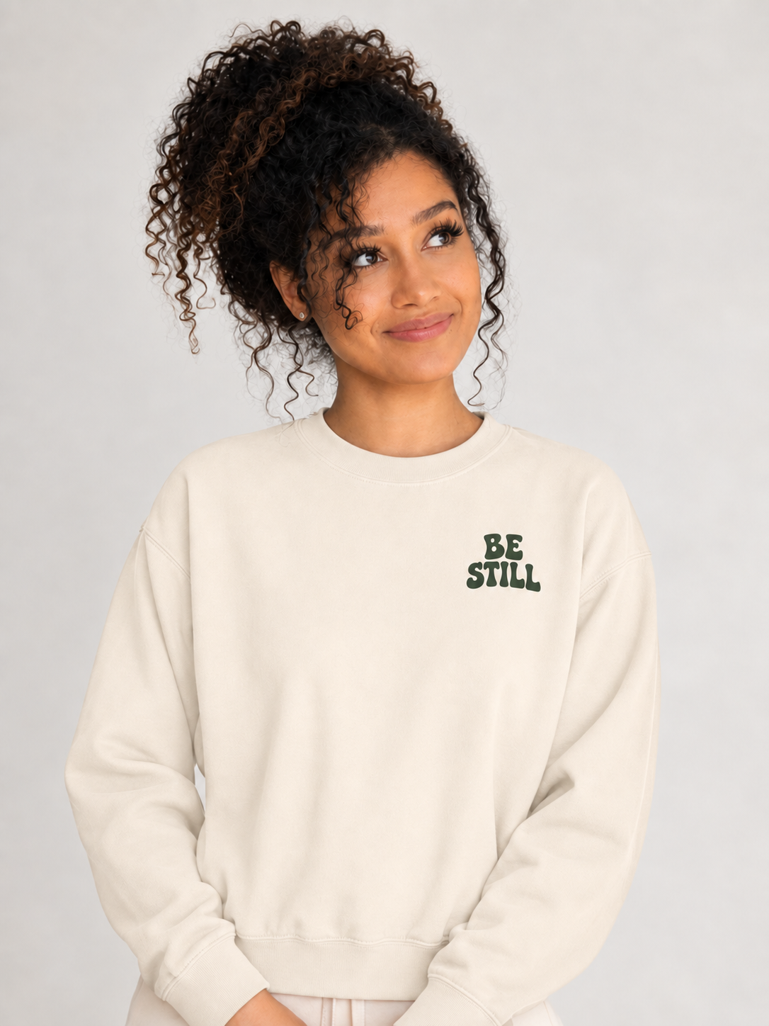 Be Still & Know Sweatshirt in Ivory — looking up pose.