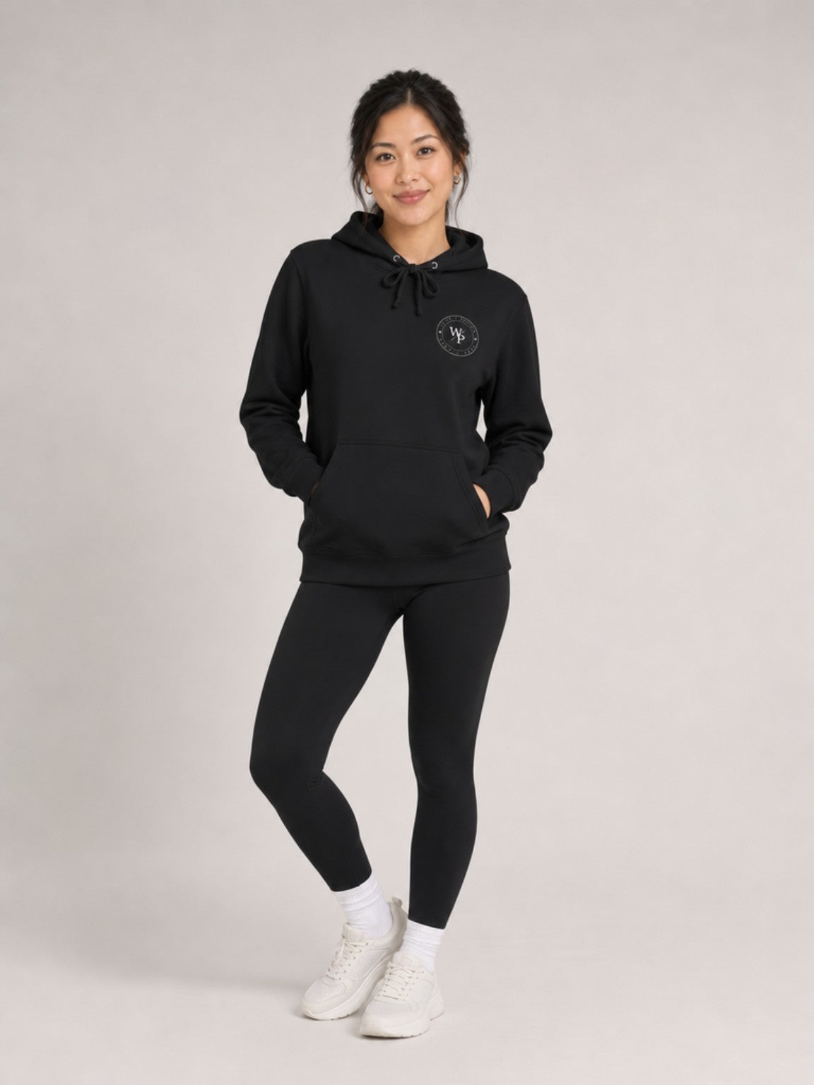 Covered in Purpose Hoodie in Black, standing view