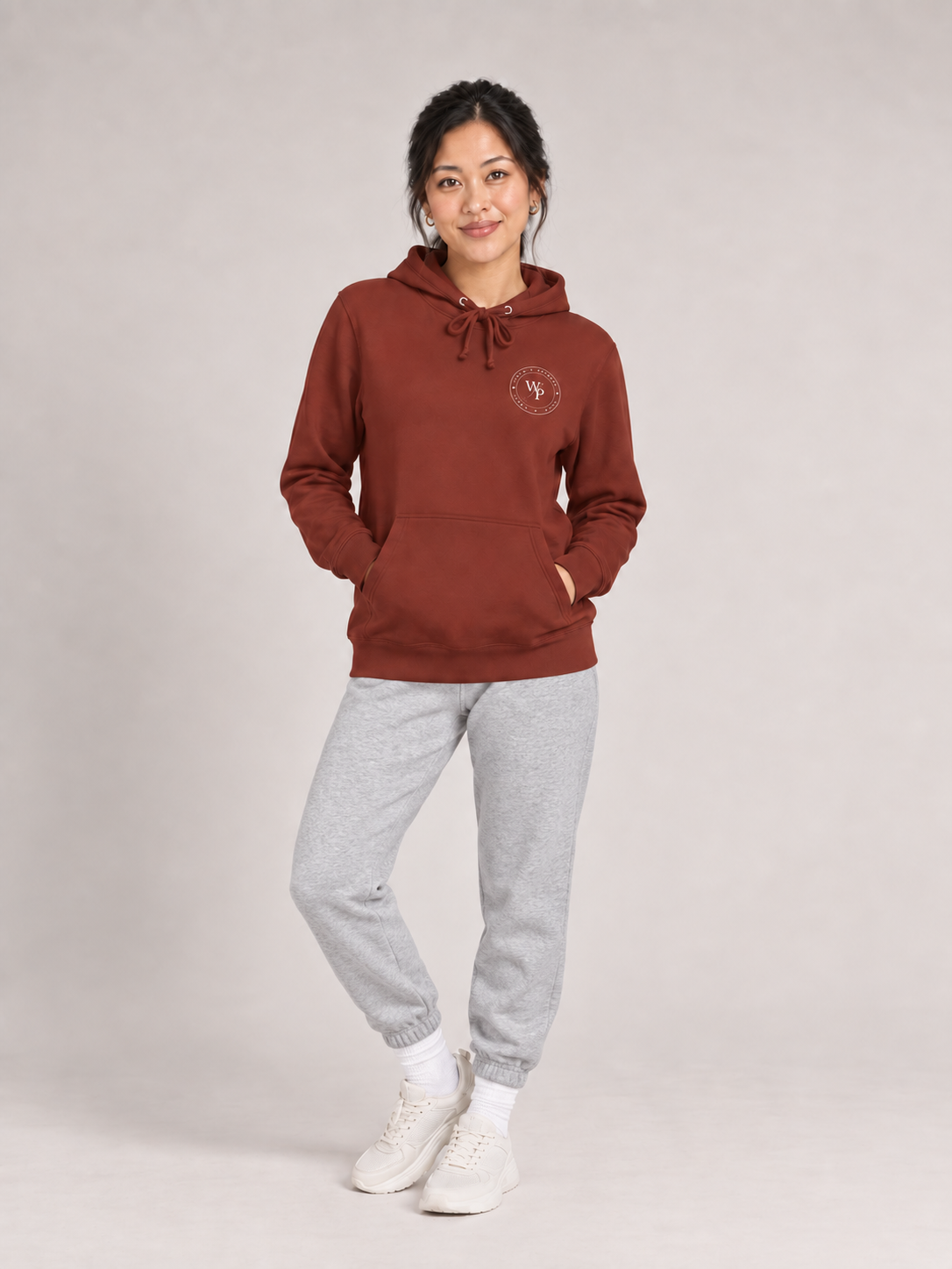 Covered in Purpose Hoodie in Paprika, standing view