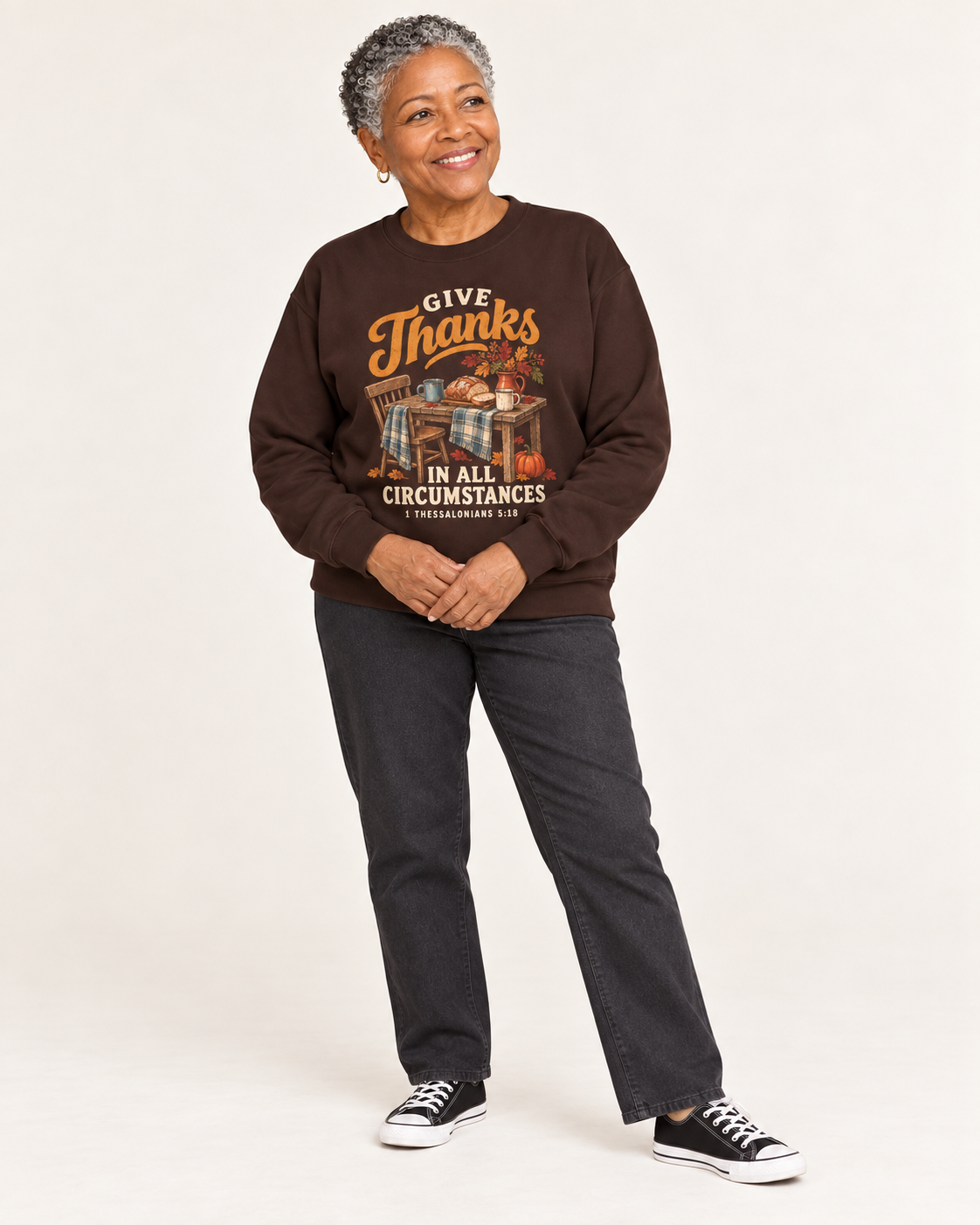 Give Thanks sweatshirt in Dark Chocolate — standing on a model