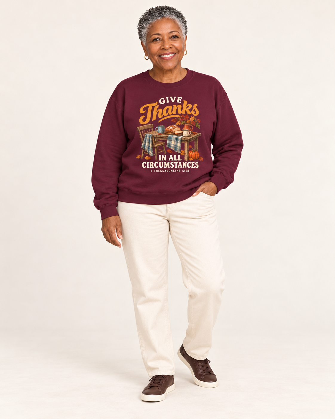 Give Thanks sweatshirt in Maroon — standing on a model