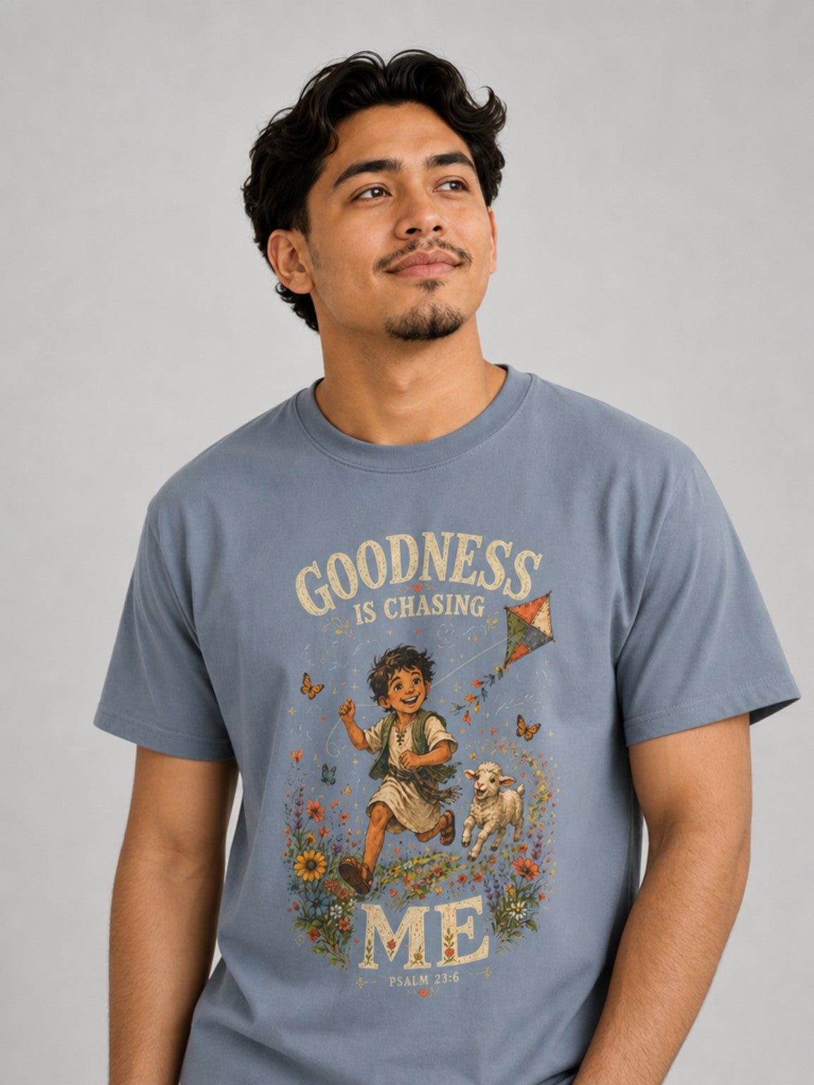 Goodness Is Chasing Me Psalm 23:6 tee in Blue Jean, featured model view
