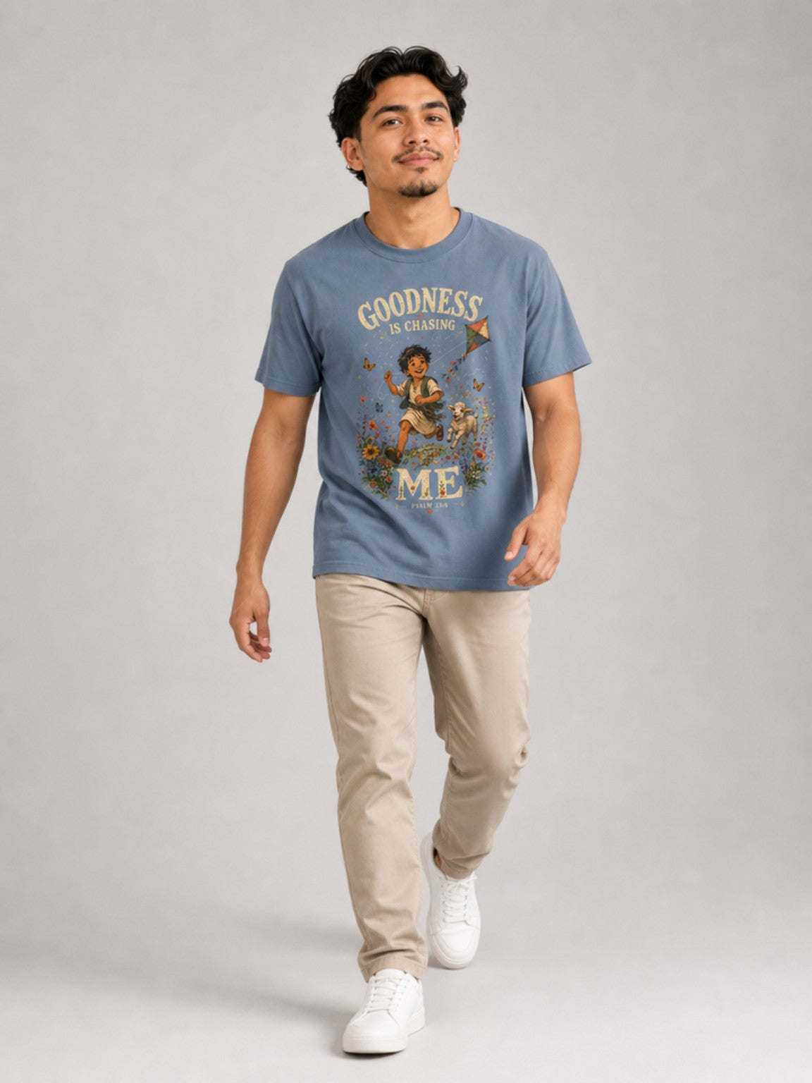 Goodness Is Chasing Me Psalm 23:6 tee in Blue Jean, walking model view