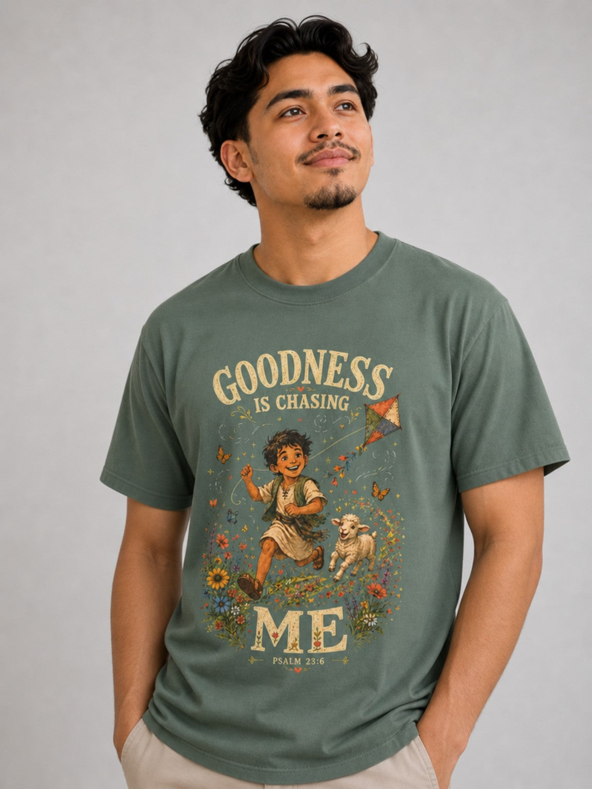 Goodness Is Chasing Me Psalm 23:6 tee in Blue Spruce, featured model view