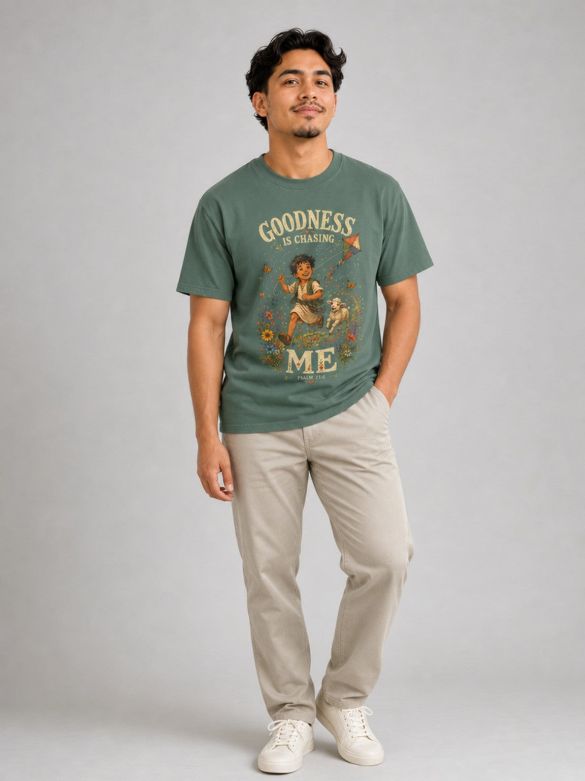 Goodness Is Chasing Me Psalm 23:6 tee in Blue Spruce, standing model view