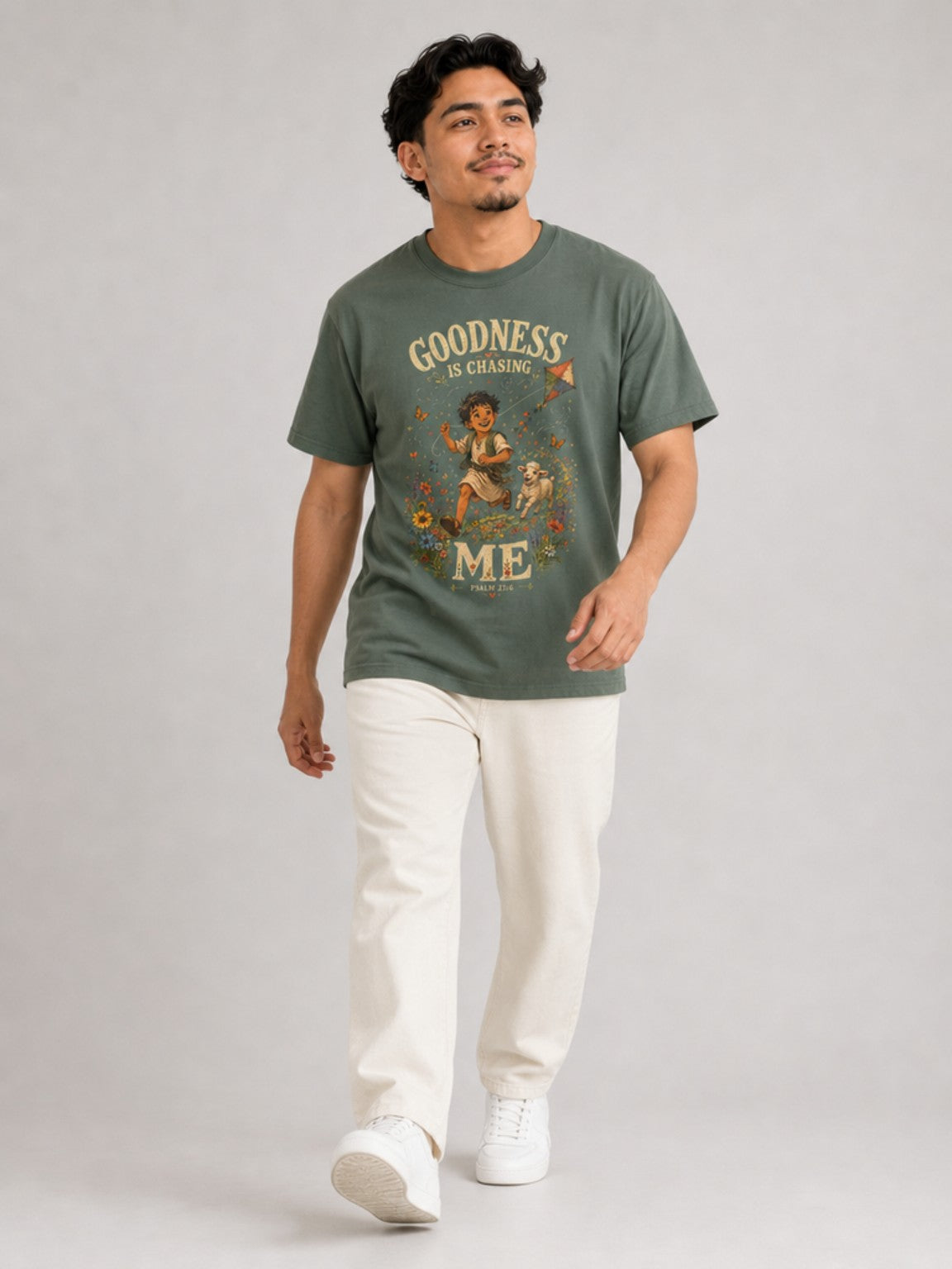 Goodness Is Chasing Me Psalm 23:6 tee in Blue Spruce, walking model view