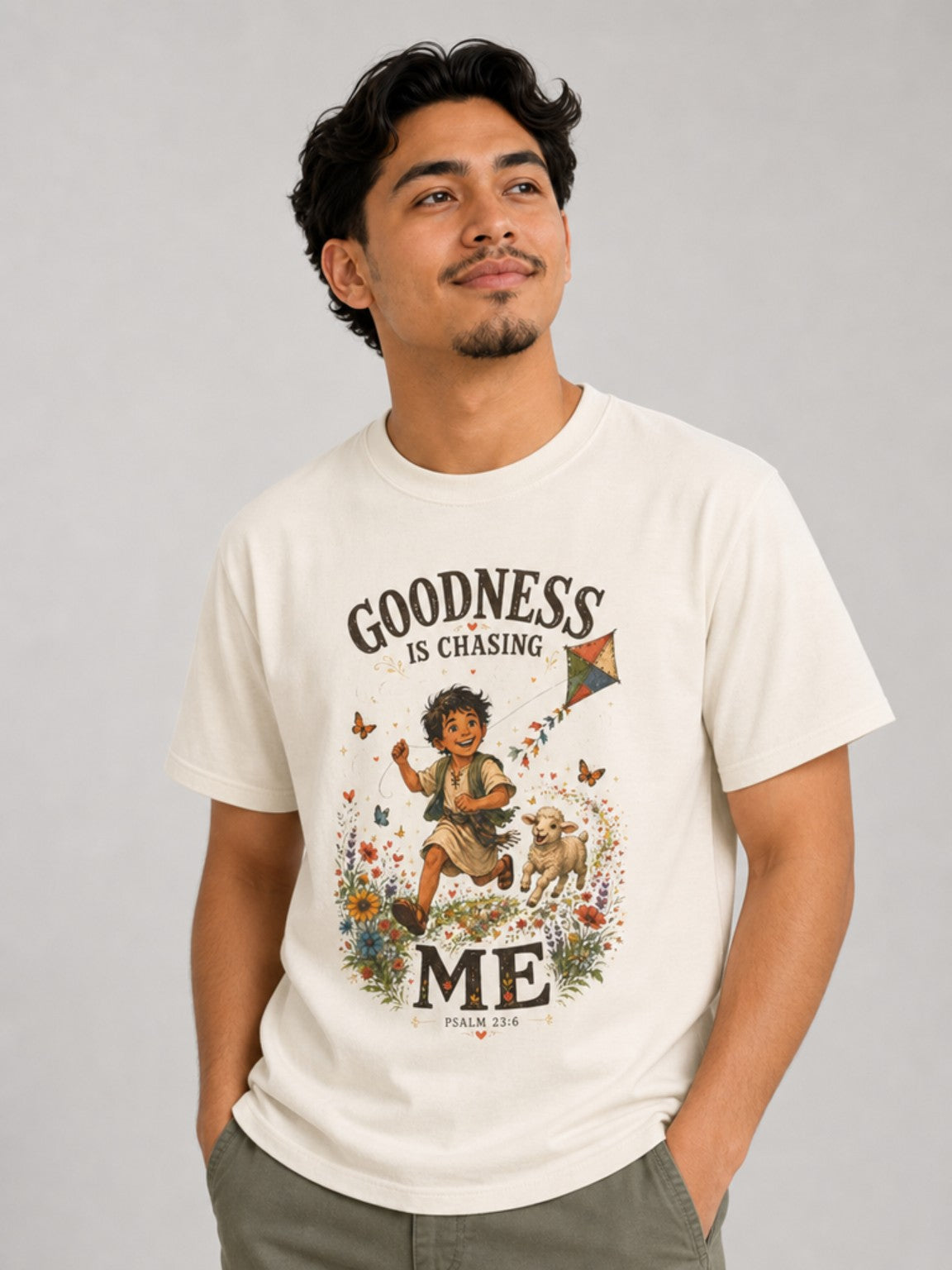 Goodness Is Chasing Me Psalm 23:6 tee in Ivory, featured model view
