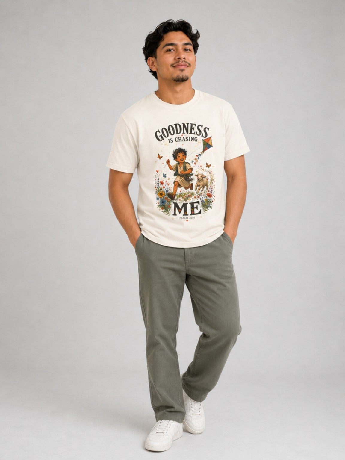Goodness Is Chasing Me Psalm 23:6 tee in Ivory, standing model view