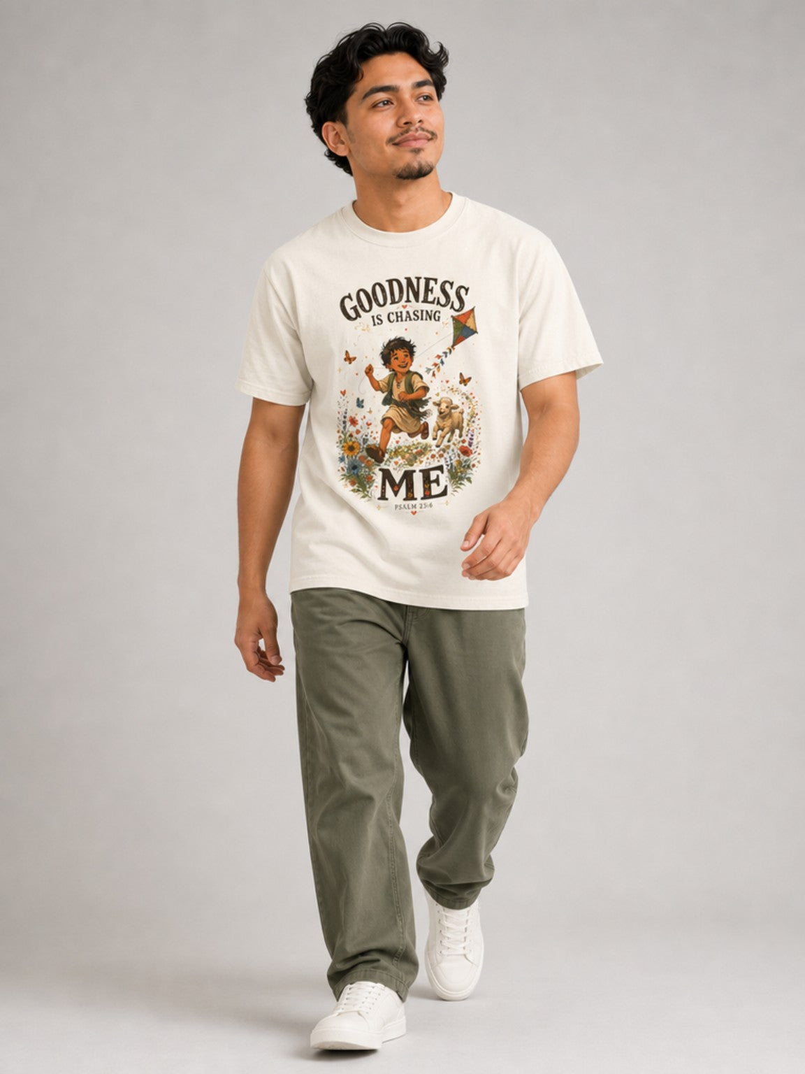 Goodness Is Chasing Me Psalm 23:6 tee in Ivory, walking model view