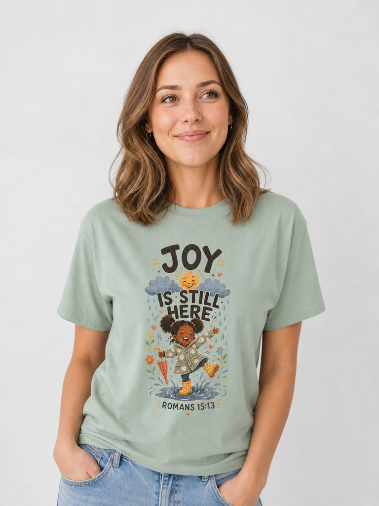 Joy Is Still Here Romans 15:13 Christian tee in Bay, close-up