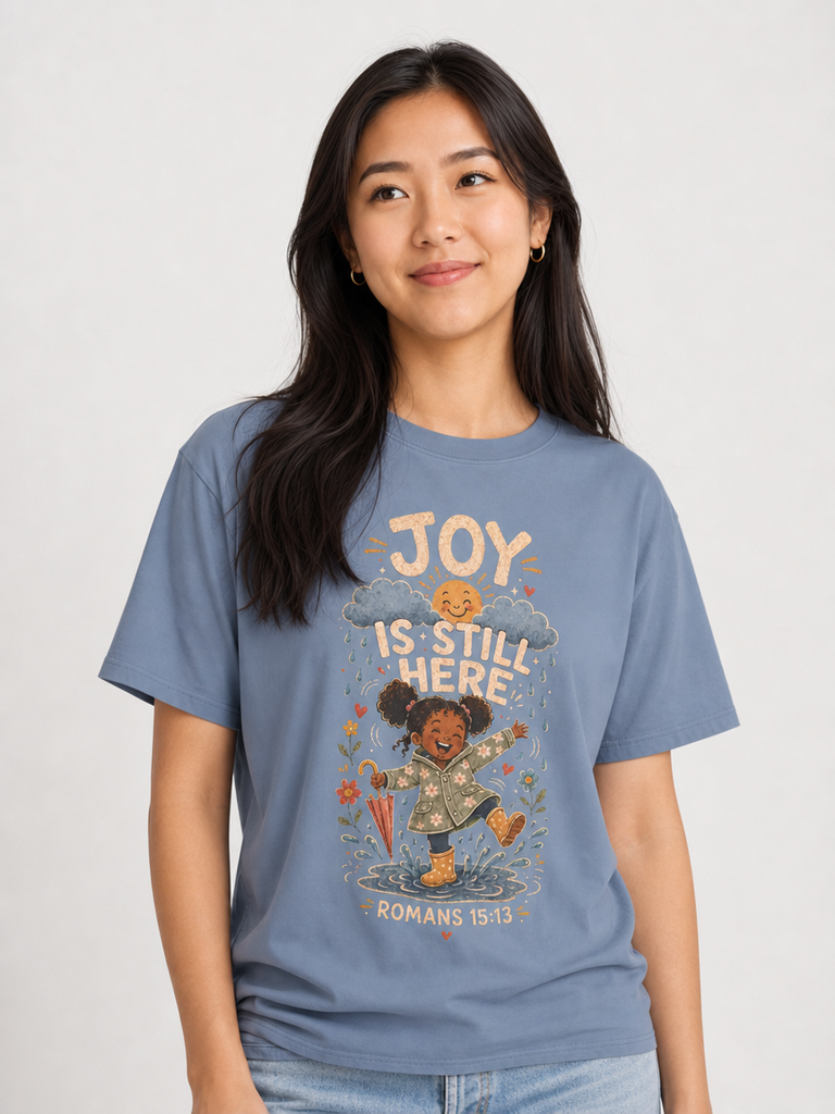 Joy Is Still Here Romans 15:13 Christian tee in Blue Jean, close-up