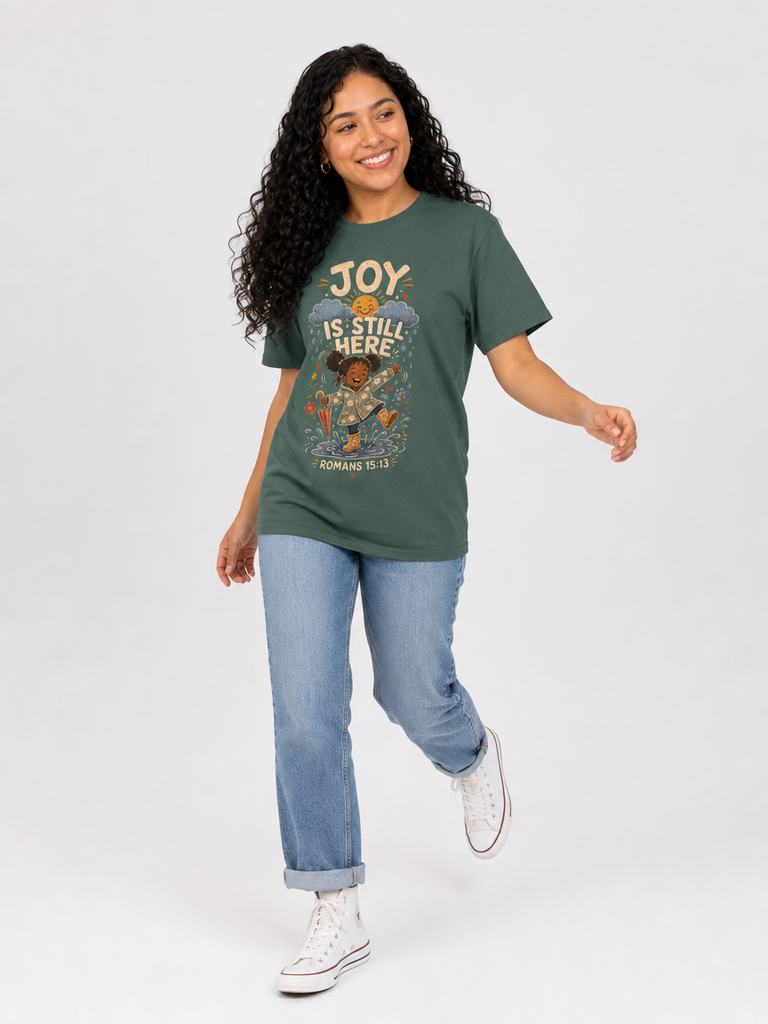 Joy Is Still Here Romans 15:13 Christian tee in Blue Spruce, walking view