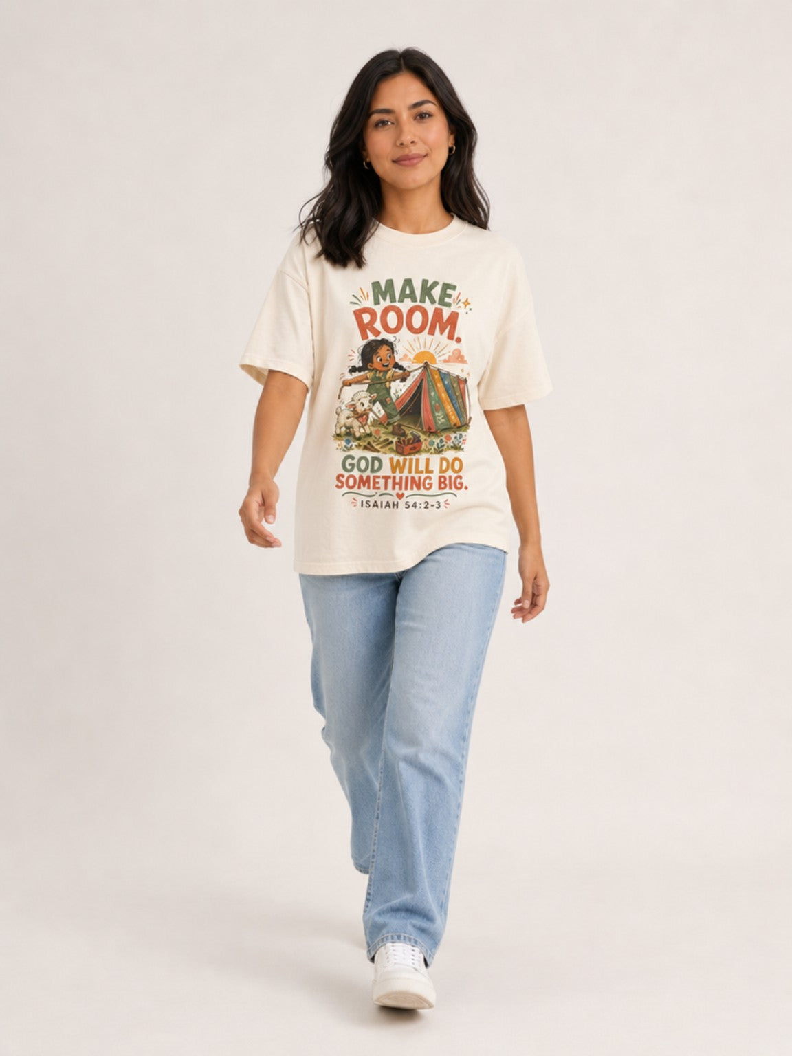Make Room — God Will Do Something Big Christian T-shirt in Ivory, mid-stride model view