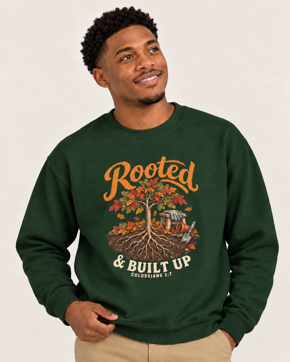 Rooted & Built Up sweatshirt in Forest Green — front design close-up on a model