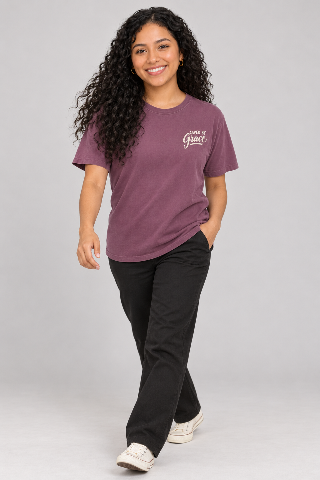 Woman wearing the Berry Saved By Grace Tee in a walking pose.