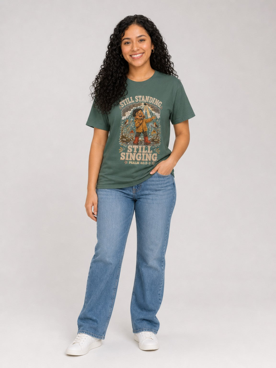 Still Standing, Still Singing Psalm 40:2-3 Comfort Colors tee in Blue Spruce, standing view