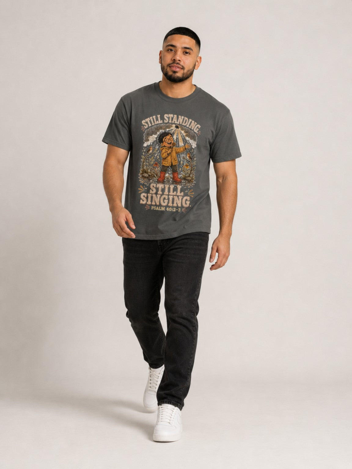 Still Standing, Still Singing Psalm 40:2-3 Comfort Colors tee in Pepper, walking view