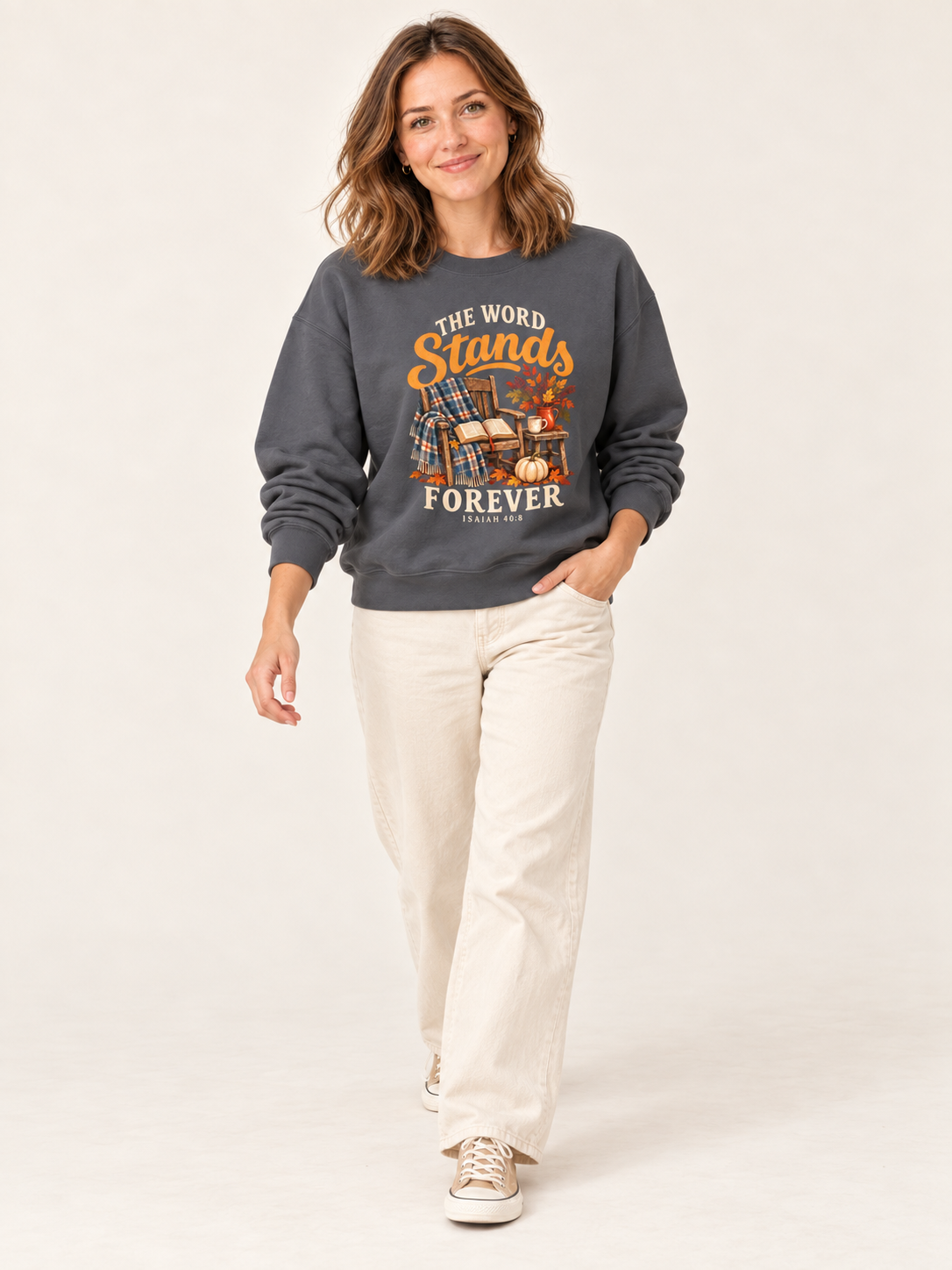 The Word Stands Forever sweatshirt in Charcoal — walking on a model
