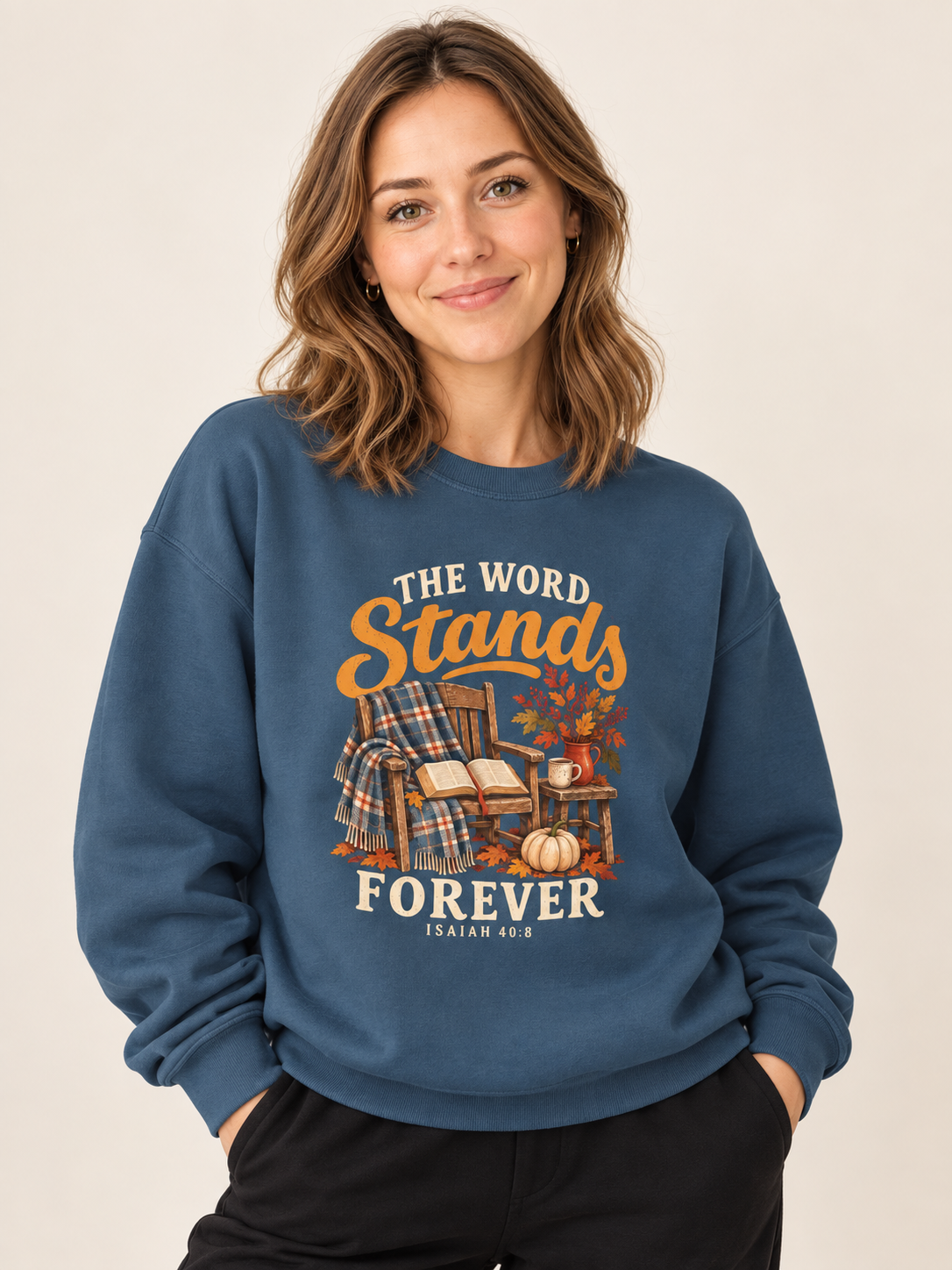The Word Stands Forever sweatshirt in Indigo Blue — front design close-up on a model