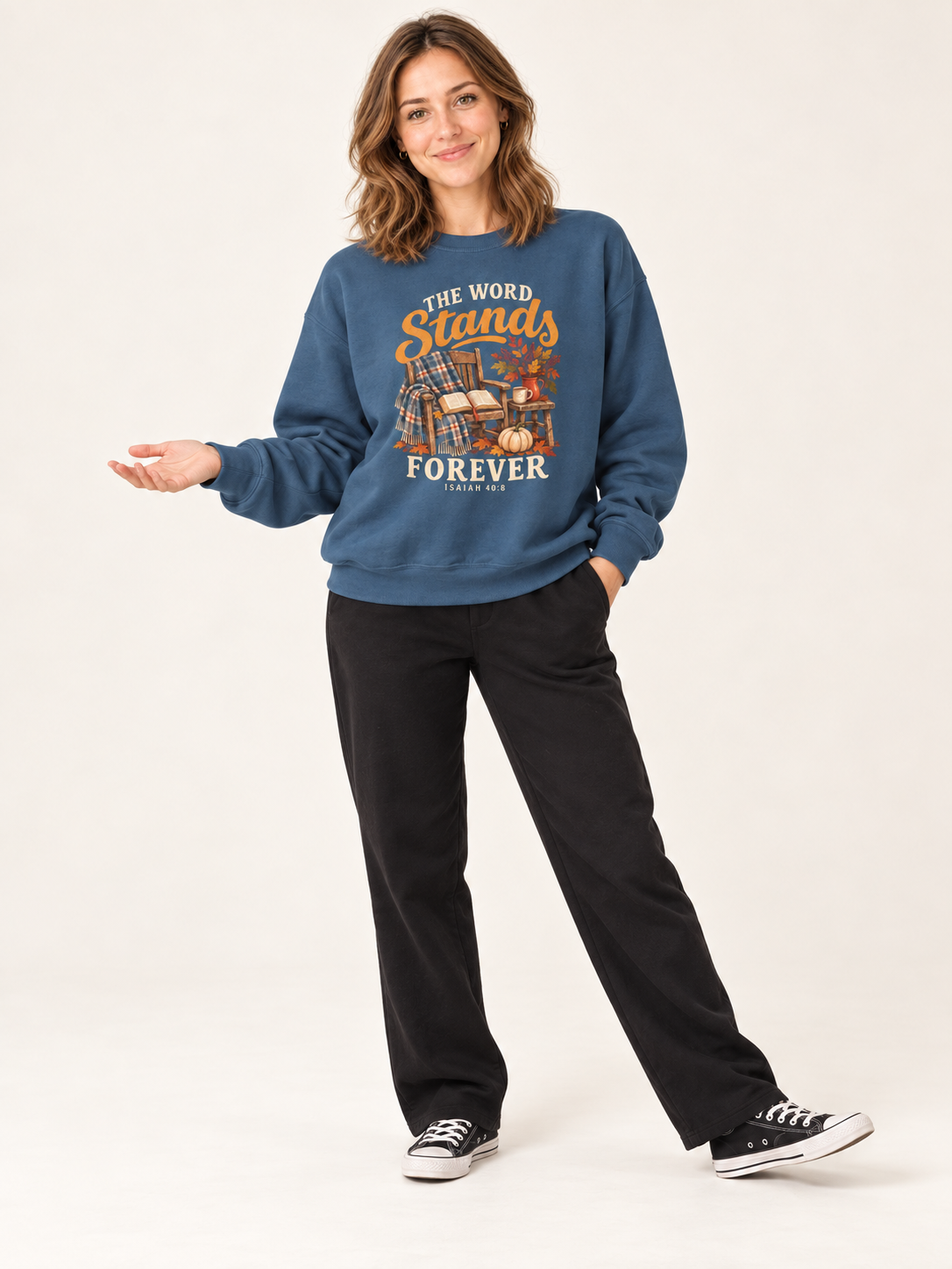 The Word Stands Forever sweatshirt in Indigo Blue — playful standing on a model