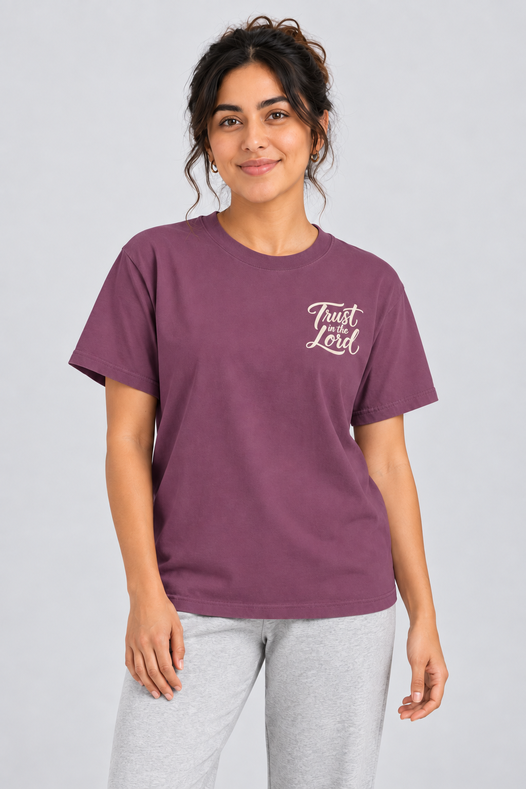 Woman wearing the Berry Trust in the Lord Tee in a close looking-up pose.