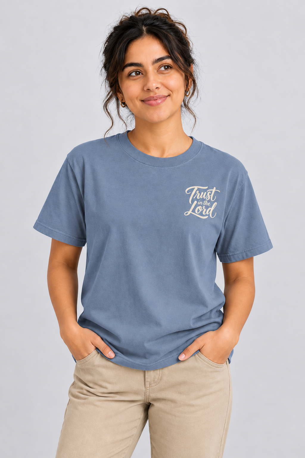 Woman wearing the Blue Jean Trust in the Lord Tee in a close looking-up pose.