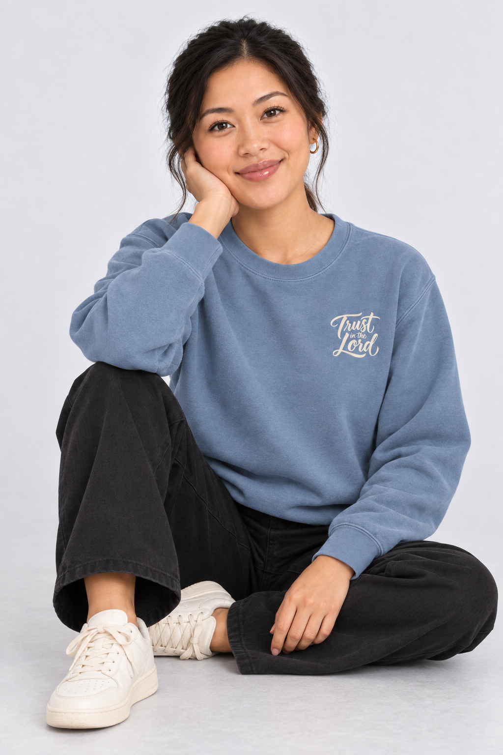Trust in the Lord Sweatshirt in Blue Jean — relaxed lifestyle pose.
